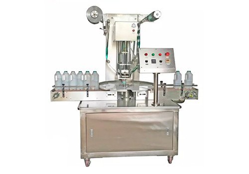 KIS-1800 Роторная машина для запечатывания молочных бутылок